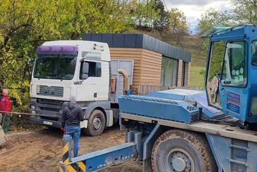Oops! How is a mobile home transported?
